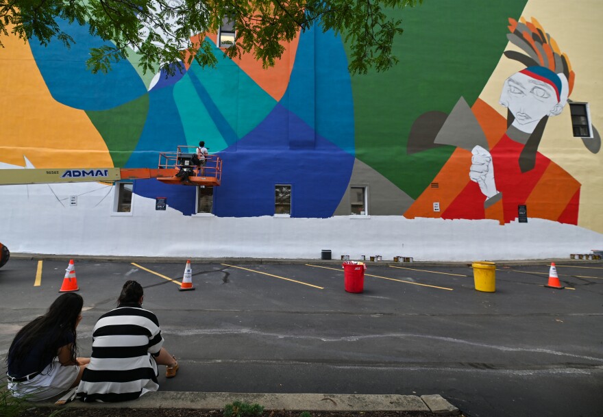 International artist Miguel Ángel Belinchón, known as "Belin" works on the new mural in Scranton.