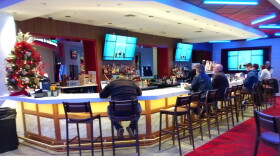 On a recent Saturday night in The Red Mile's new sports book area, traffic was light — perhaps because some gamblers were betting online.