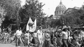 Indians taking part in the Longest Walk, which is heading for a final destination of Washington, D.C., march past the State Capitol in Harrisburg, Thursday, July 7, 1978 after reconciling with Harrisburg Mayor Tim Doutrich on remarks he made contained in a newspaper article concerning the Indians use of city property. The Indians next stop will be York, Pa.