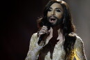 Conchita Wurst, representing Austria, performs the song 'Rise Like a Phoenix' during the second semifinal of the Eurovision Song Contest. Wurst, a bearded female impersonator, is among the favorites to win the 2014 contest.