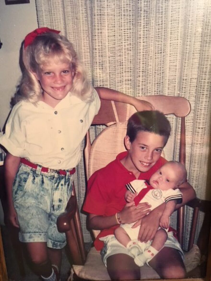 Sam Piazza as a baby with his siblings.