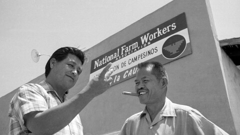 United Farm Workers leader Cesar Chavez, left, who led the fight as head of the AFL-CIO union local, talks with Larry Itliong, leader of the Filipino Agriculture Workers Organizing Committee, in front of union headquarters at Delano, Calif., July 28, 1967.