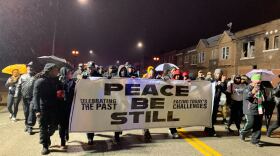 Community leaders, activists and clergy members marched east on Dr. Martin Luther King Drive to call for an end to gun violence in the St. Louis area.