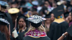 A graduate uses her mortarboard to express appreciation of her parents. (UCI UC Irvine/Creative Commons)
