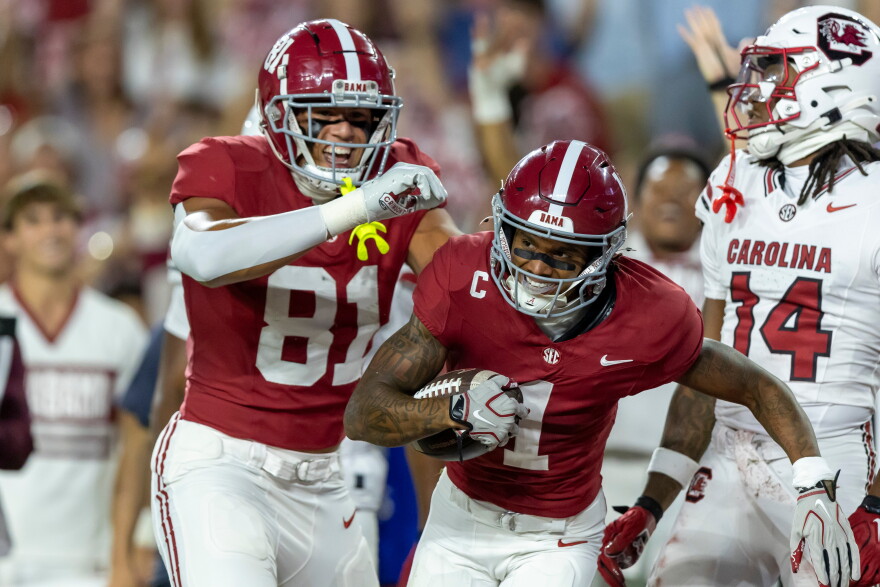 Alabama tight end Kaleb Edwards (81) and wide receiver Ryan Coleman-Williams (1) celebrate after a score by Coleman-Williams during the first half of an NCAA college football game against South Carolina, Saturday, Sept. 26, 2026, in Tuscaloosa, Ala. (AP Photo/Vasha Hunt)