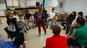 Students in Andy Slaterâ€™s science class start the morning by playing a word game. Students jump up to move to an open seat if they agree with what the standing student says â€“ sort of like musical chairs.