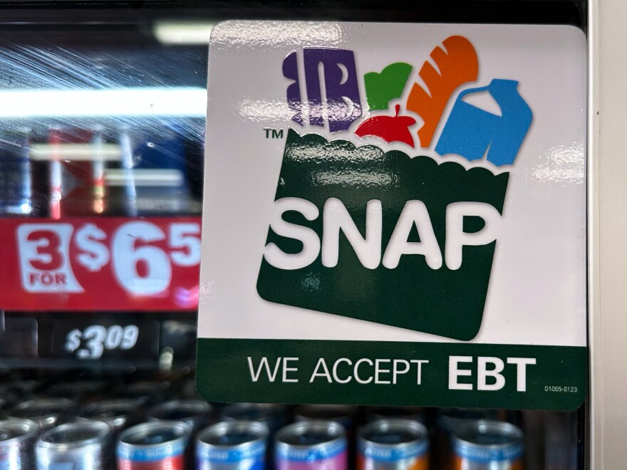 FILE - SNAP EBT information sign is displayed at a gas station in Riverwoods, Ill., Saturday, Nov. 1, 2025.
