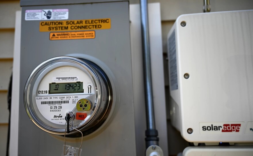 Watt-hour meter and dual source inverter on the home of George St. Amand.