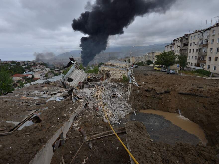 Smoke rises in the aftermath of recent shelling during the ongoing fighting between Armenia and Azerbaijan. This photo, provided by the Armenian government, shows the aftermath of recent shelling in the city of Stepanakert.