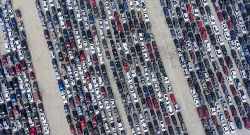 April 9, 2020, San Antonio, Texas, USA: People wait in their cars Thursday, at Traders Village for the San Antonio Food Bank to begin food distribution. 10,000 people seek San Antonio Food Bank help. The need for emergency food aid has exploded in recent weeks due to the COVID-19 coronavirus epidemic. The Labor Department said Thursday 6.6 million people applied for first time unemployment benefits. Vehicles start lining up before dawn as locals hit hard by economic effects of coronavirus seek aid from the San Antonio Food Bank. (Credit Image: © William Luther/San Antonio Express-News via ZUMA Wire)
