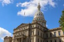 Michigan Capitol building in Lansing on a summer day.