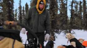 A musher and his dogs