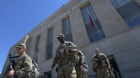 Soldiers with the Indiana Army National Guard's 76th Infantry Brigade Combat Team exit the District of Columbia National Guard Armory in Washington, D.C., and board buses Sunday June 7, 2020, to return to Indiana after spending the past week in the District in response to civil unrest in the wake of the death of George Floyd.
