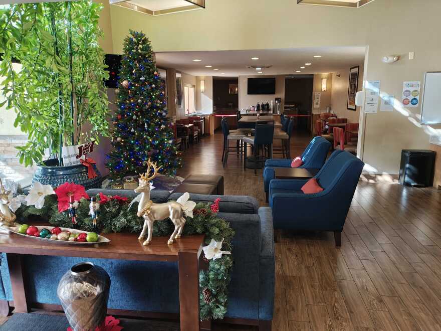 The lobby at Ponderosa Place includes a large dining room where formerly unhoused families can eat free breakfast everyday during their stay, which is only one of the many services that also include daily chek-ins, assistance with job searches and getting into school. The former hotel was converted to house 76 families in October.