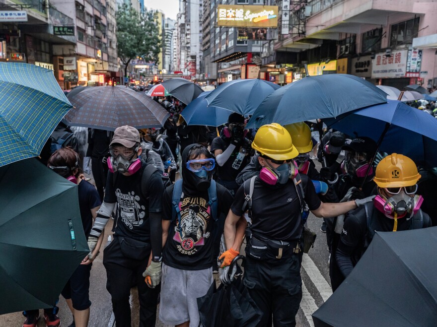 Pro-democracy protests continued for the 18th week in Hong Kong on Sunday. Demonstrators continued to wear face masks and goggles despite a ban put into place by the city's chief executive Carrie Lam on Friday.