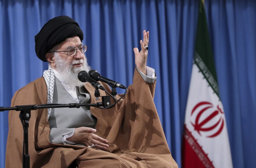 Iran's supreme leader, Ayatollah Ali Khamenei, speaks with a group of Revolutionary Guards and their families in Tehran on April 9. Tensions between Iran and the U.S. have escalated recently following Iran's shootdown of a U.S. drone and U.S. cyberattacks against an Iranian intelligence group. On Monday, President Trump announced financial sanctions against Khamenei and other top officials.