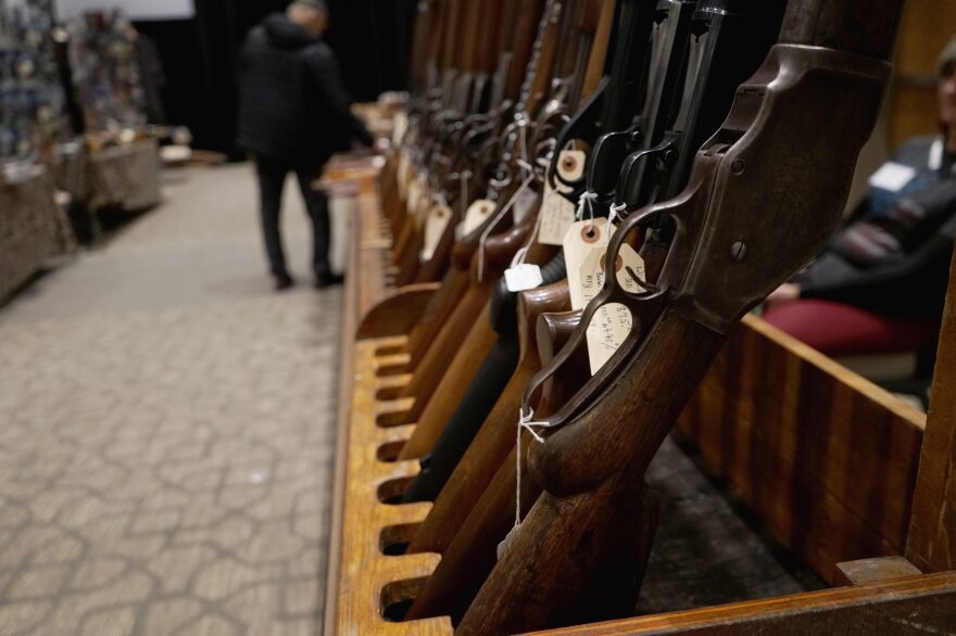 Rows of guns for sale were on display at the Vernal Knife and Gun Show in northeastern Utah, where firearms are imbued in the culture.