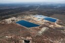 The Clean Air Act requires uranium waste storage pits at the White Mesa mill near Blanding, Utah, to be covered in water to control radon gas. Environmental groups and local tribes say the pits have been improperly covered in recent years threatening public health and the environment.