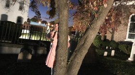 Photo by Paul Bibeau. Chenna Cook, one of the Hampton Horror Tours players, hides in wait for a tour group.