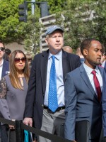 Job seekers line up at a technology fair in Los Angeles in March. Employers added more jobs than analysts expected last month, as the jobless rate remained at a nearly 50-year low of 3.7 percent.