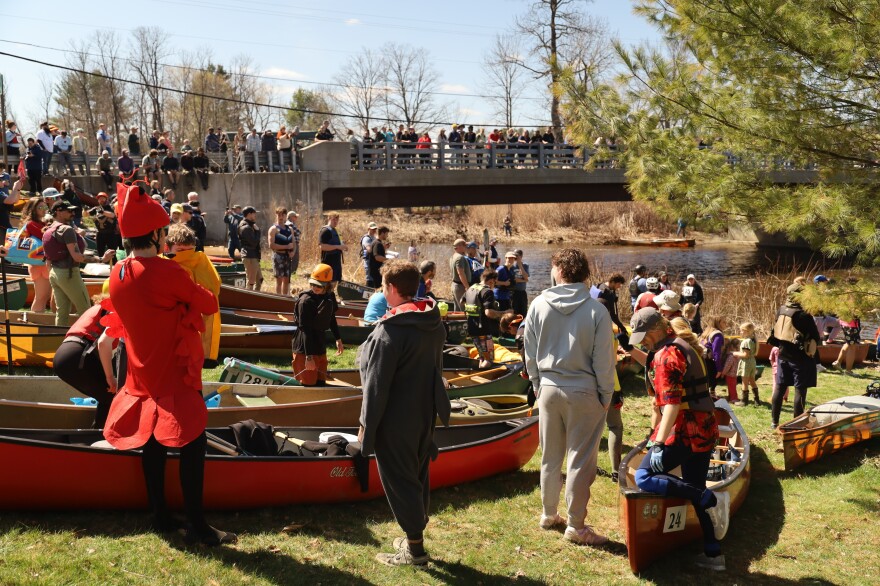 Paddlers wait to start their heat of the Kenduskeag Canoe Race. Lots of participants dressed up in costumes for the race.