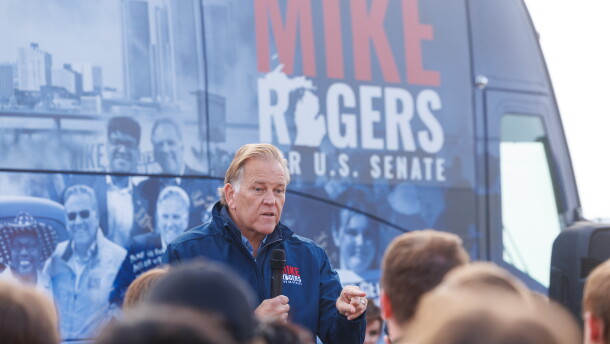 Republican U.S. Senate nominee Mike Rogers speaks in Lansing Township, Mich., on Oct. 24, 2026, during a stop on his "We Have a State to Save" bus tour.