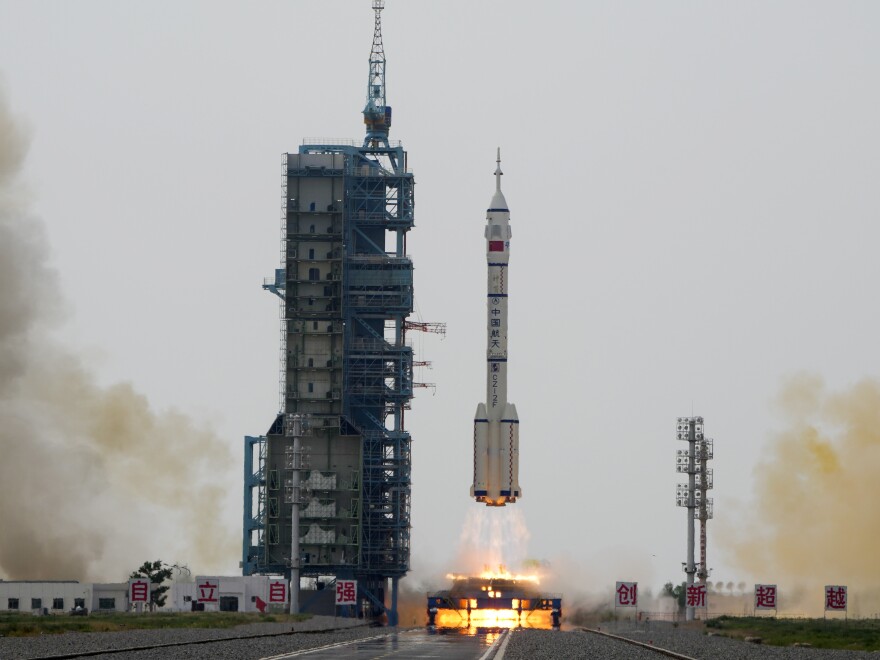 China launches a new crew into space, including its first civilian ...