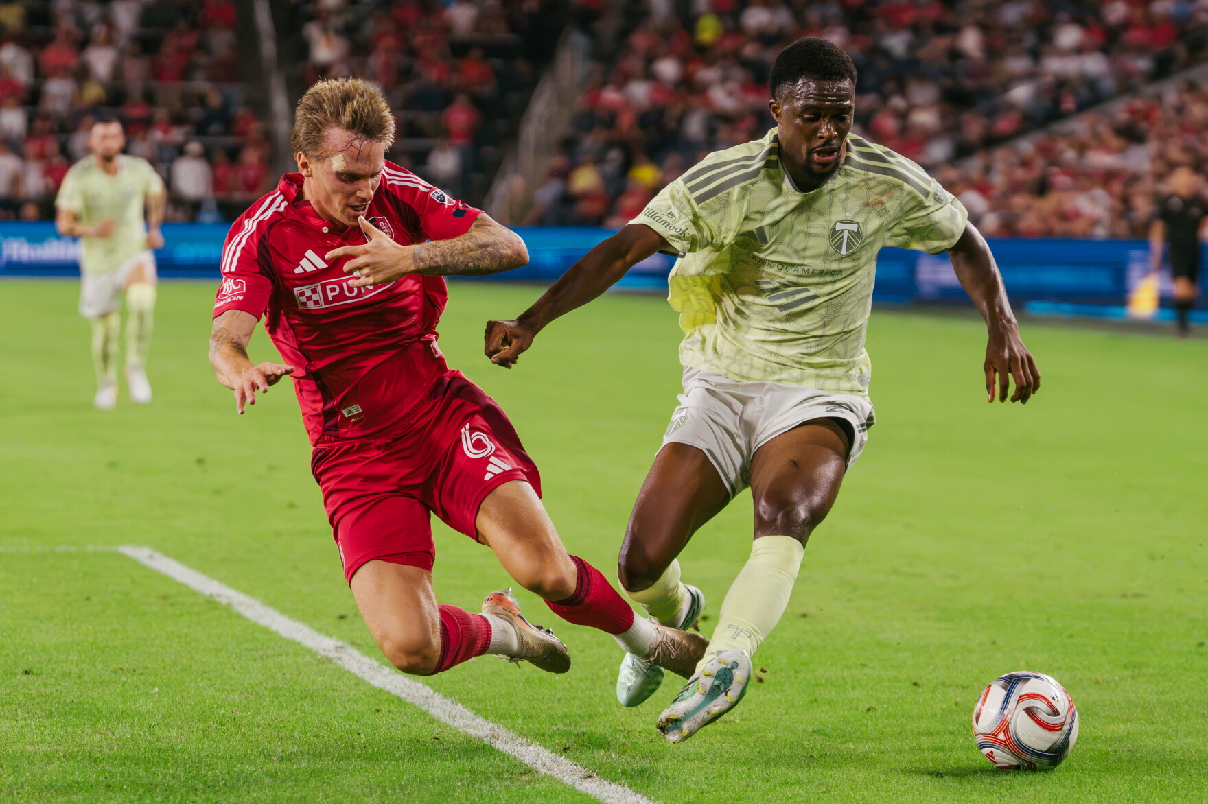 St. Louis City SC midfielder Conrad Wallem (#6) challenges Portland Timbers midfielder David Pereira Da Costa (#10) for the ball during their match at Energizer Park on Wednesday, Oct. 28, 2026, in St. Louis’ Downtown West neighborhood.
