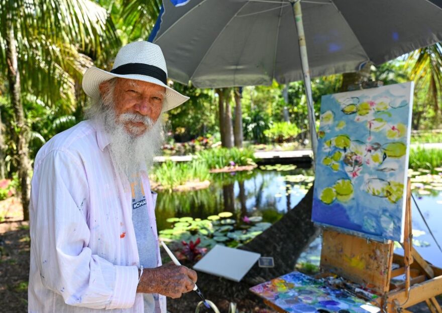 Sir Roland Richardson painting on location.
