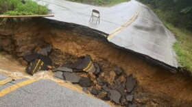 Road washed out from flood waters in Clay County, KY