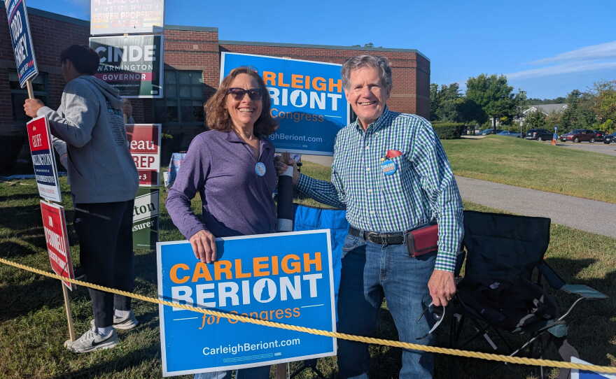 Supporters of candidates turned out to hold signs outside the polls at Bedford High School on Sept. 8, 2026.