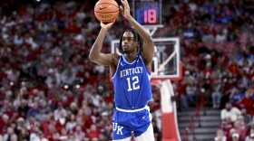 Kentucky guard Antonio Reeves (12) shoots against Arkansas during the first half of an NCAA college basketball game Saturday, Jan. 27, 2024, in Fayetteville, Ark. (AP Photo/Michael Woods)