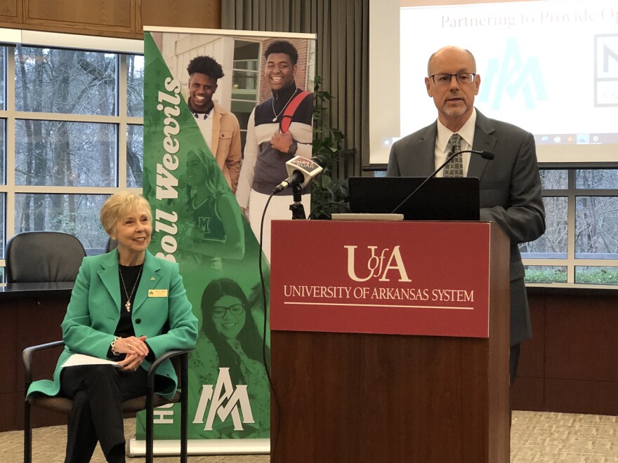 University of Arkansas System President Donald Bobbitt delivers remarks at the UA System Office in Little Rock Tuesday alongside Peggy Doss, chancellor of the University of Arkansas at Monticello.