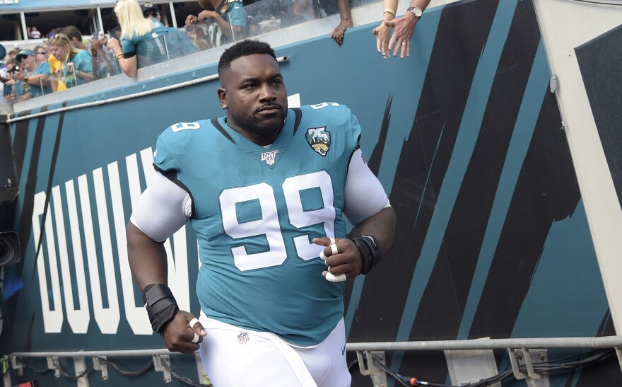 Jacksonville Jaguars defensive tackle Marcell Dareus (99) runs onto the field during player introductions before an NFL football game against the New Orleans Saints Sunday, Oct. 13, 2019, in Jacksonville, Fla. (AP Photo/Phelan M. Ebenhack)