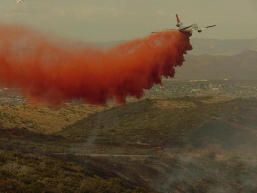 plane drops fire retardant