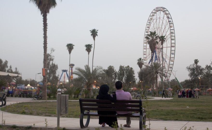 Militants have carried out massacres and suicide bombings in the north, but have not taken hold in Baghdad, though violent deaths swelled in the city this summer. In al Zawra park, visitors escape the tension to enjoy lawns, fountains and a giant Ferris wheel.