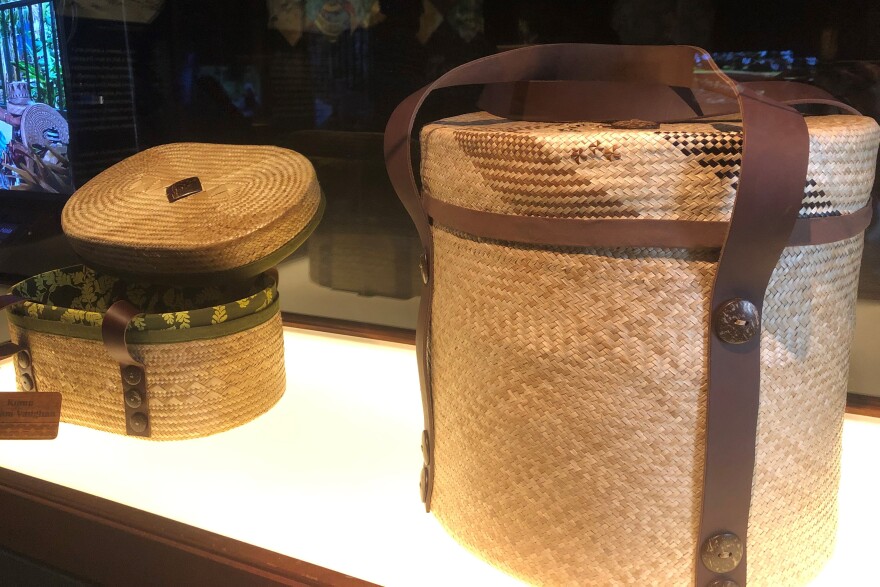 Woven baskets by Ipolani Vaughan (left) and Bill Keoua Nelsen (right).