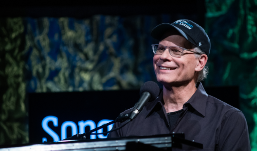 Eric Gnezda, the creator and host of the PBS show “Songs at the Center” reflects on his life and career in a memoir.