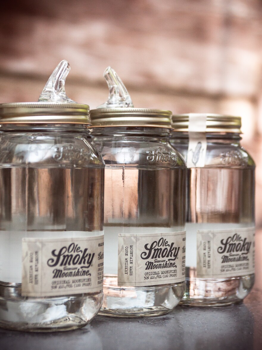 Ole Smoky's bottles are designed in keeping with the local eastern Tennessee tradition to "pass the jar." Moonshine was typically drunk out of old Mason jars.