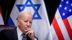 President Biden joins Israel's Prime Minister for the start of the Israeli war cabinet meeting, in Tel Aviv on Oct. 18, 2023, amid the ongoing battles between Israel and the Palestinian group Hamas. (Miriam Alster/POOL/AFP via Getty Images)
