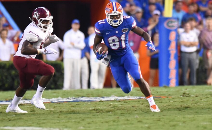 Florida wide receiver Antonio Callaway (81) tries to speed past New Mexico State defensive back Christian Gibson (5).