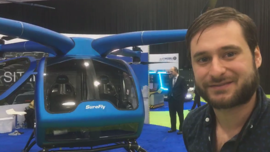 Elliot Bokeno with SureFly helicopter photo