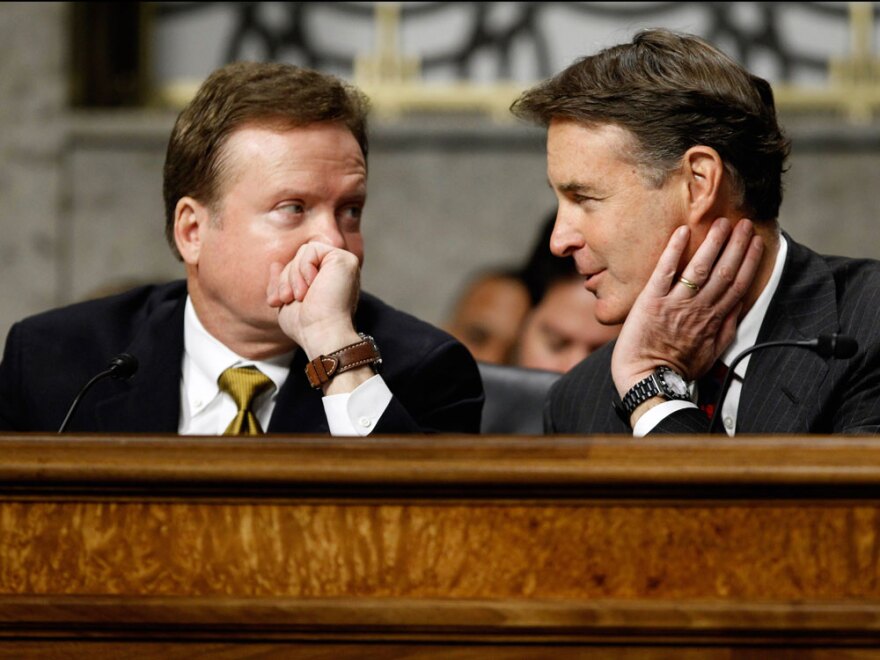 Democratic Sen. Jim Webb of Virginia (left) speaks with fellow Democrat Sen. Evan Bayh of Indiana during Thursday's hearing.