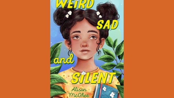 Cover of "Weird Sad and Silent" by Alison McGhee; colorful illustration of a girl in a yellow-orange floral shirt, holding a book and standing between two green plants