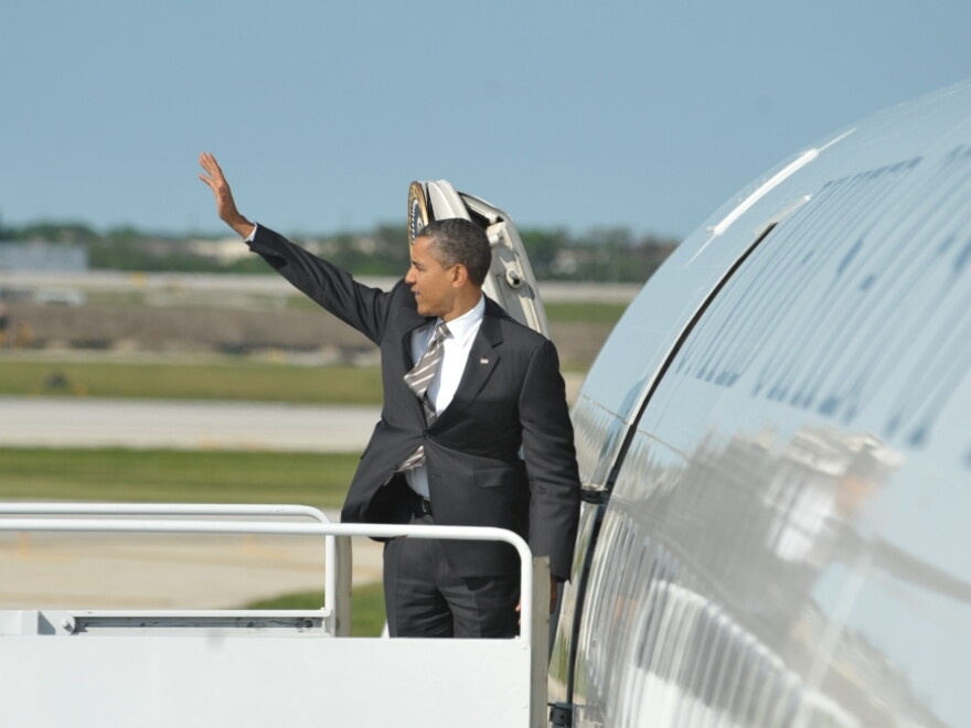 President Barack Obama boards Air Force One at Chicago's O'Hare airport on May 21, 2012. The president has gone on the attack about his opponent's time at Bain Capital.
