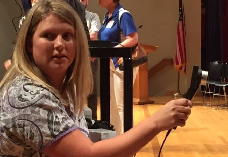 School nurse Heather Gordon demonstrates the new equipment.