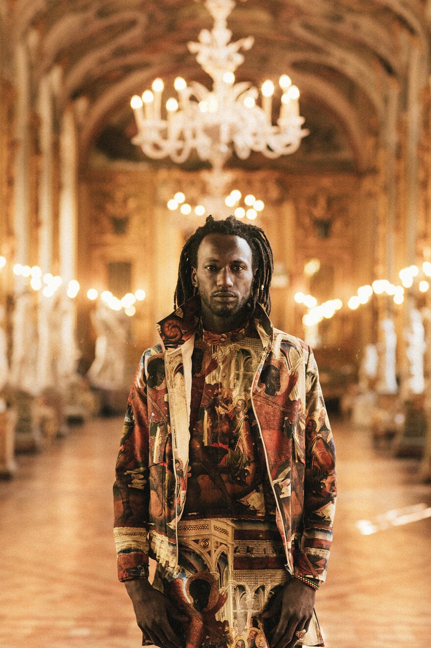 Ousman Pa Manneh, originally from Gambia, models clothing by Ikiré Jones in Rome. "No matter how beautifully we are dressed," he said, "we are considered a threat."