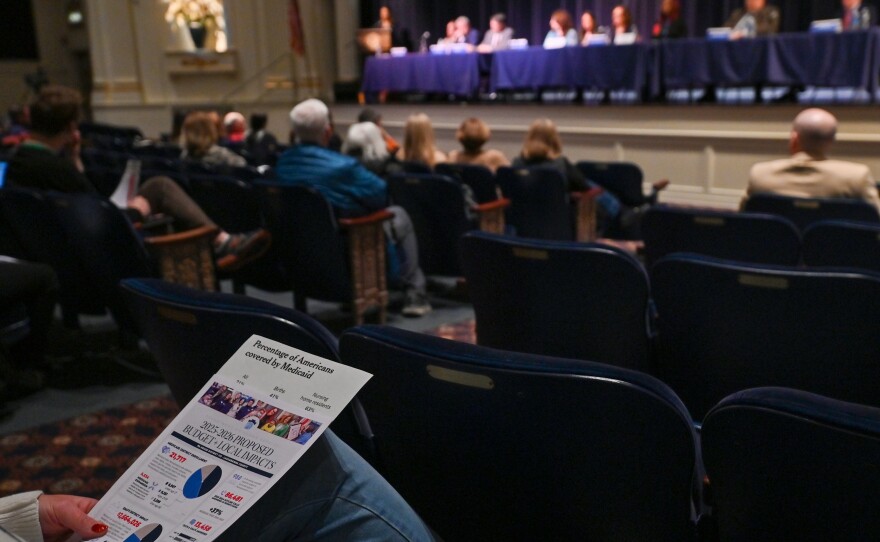 Event organizers handed out local impact flyers that outlined the predicted impact of proposed Medicaid cuts.