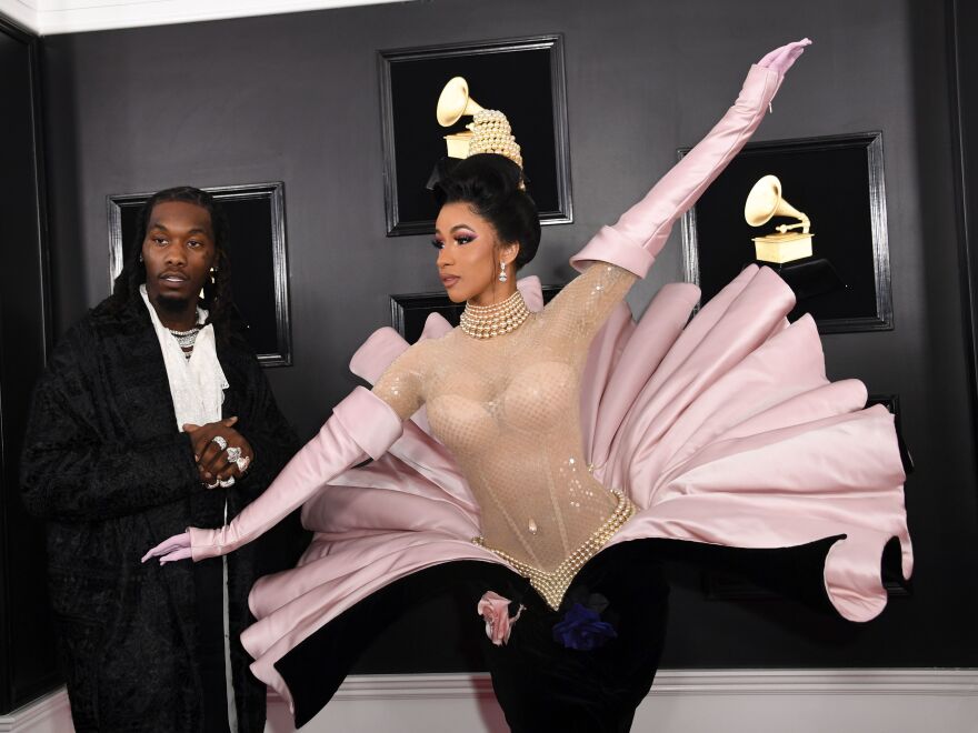 Rapper Cardi B wears a Thierry Mugler design as she arrives with rapper Offset at the Grammy Awards in 2019.