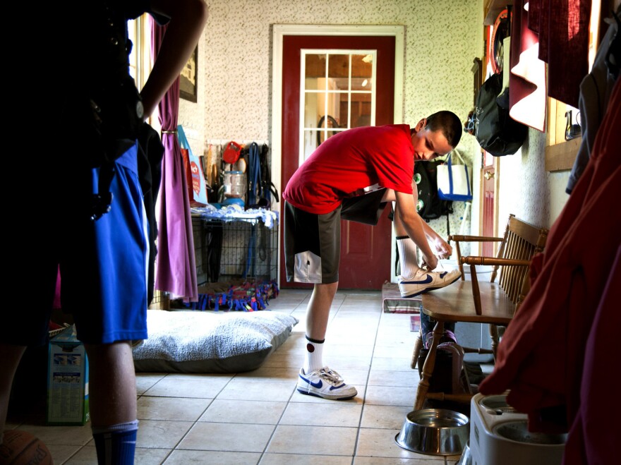 Noah and friend Chandler Bean, 14, left, gear up for school.